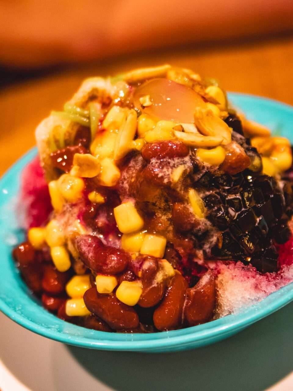 Ais kacang - colorful, sweet chaos of Malaysia. Ice, beans, corn, jellies, and syrups that together only make sense here.