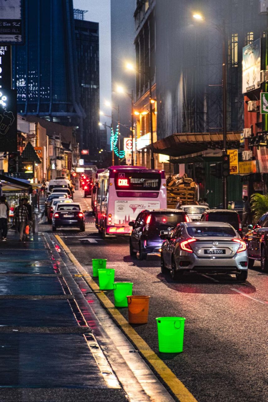 Street traffic in Kuala Lumpur. The city is sprawling and often congested, so it's best to combine public transport with Grab rather than moving around solely on foot.