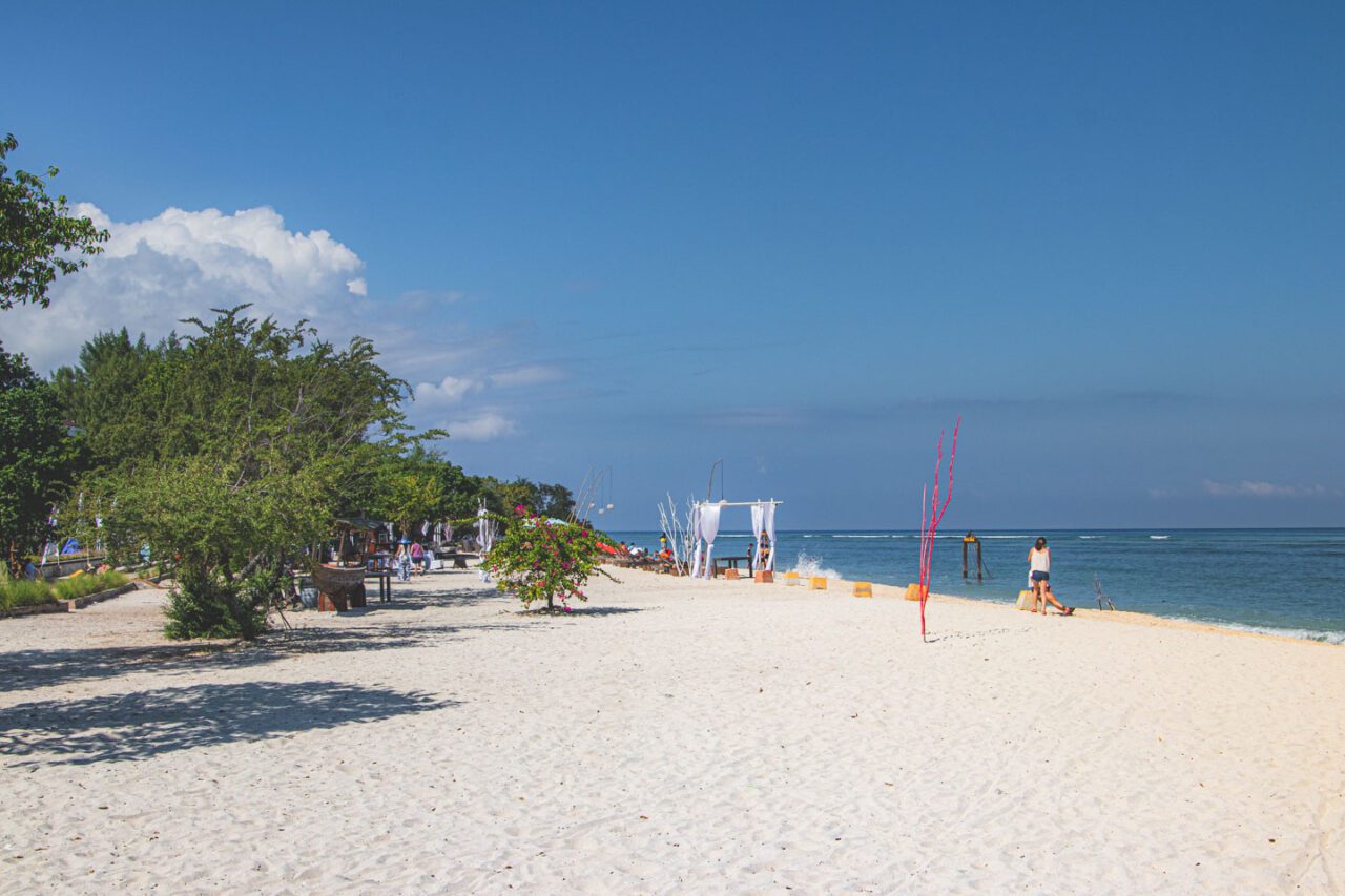White sandy beach with turquoise water on Gili Trawangan.