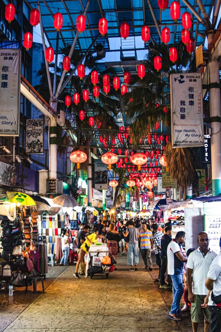 Chinatown in Kuala Lumpur after dusk - red lanterns, street bustle, and a completely different pace of the city