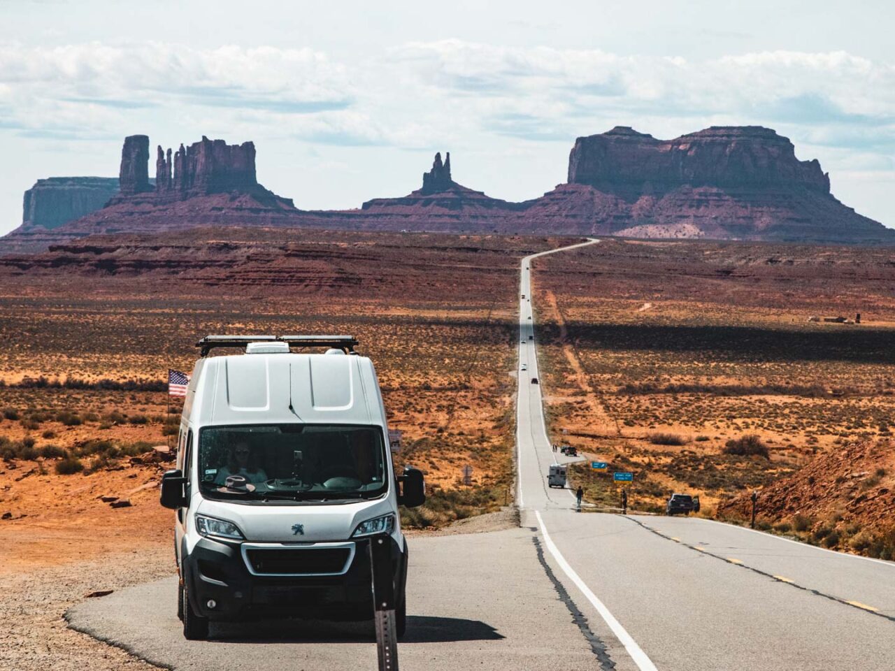 campervan on road at Forest Gump Point Monument Valley Utah scenic drive