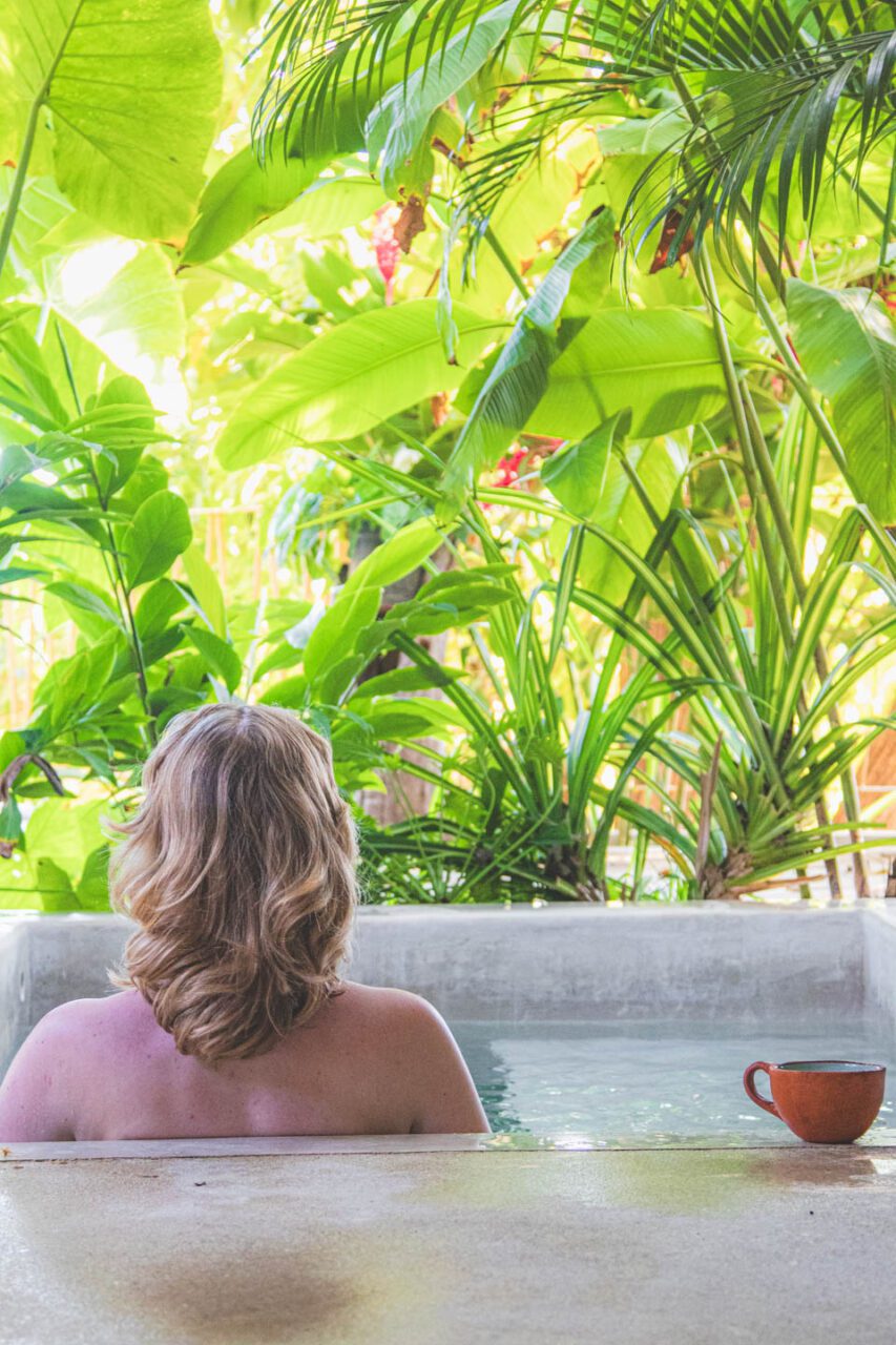 Relaxing in a private plunge pool at Hotel Yam in Mazunte, Oaxaca, Mexico.