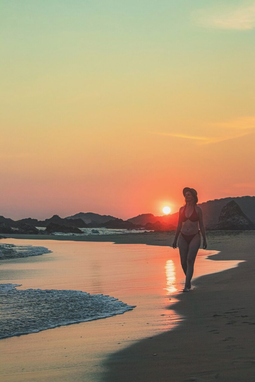 A walk along the beach in San Agustinillo at sunset.