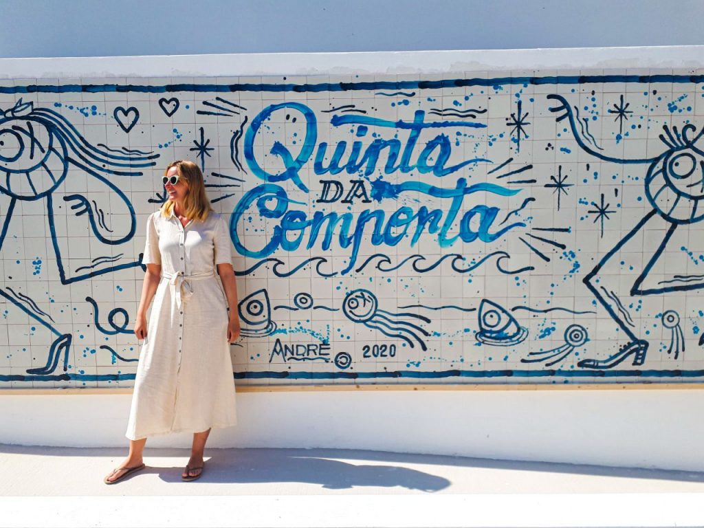 A woman in front of the Quinta da Comporta hotel in Portugal