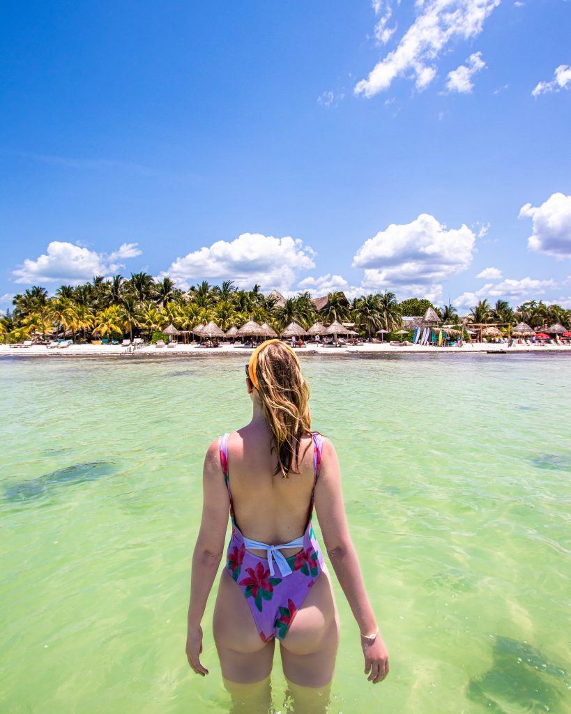 A woman in the sea on Isla Holbox, Quintana Roo, Mexico