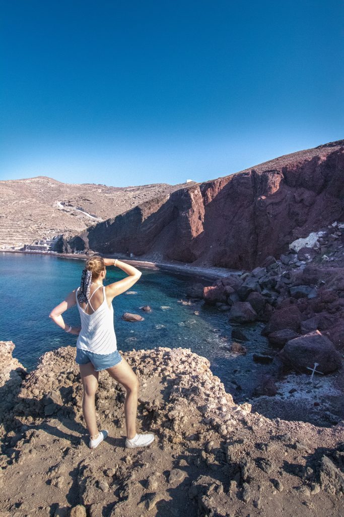 Woman admiring Red Beach, Santorini, Greece