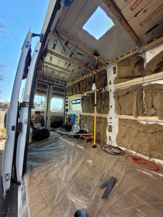 Drilling Holes in the Camper van Roof for the Fan