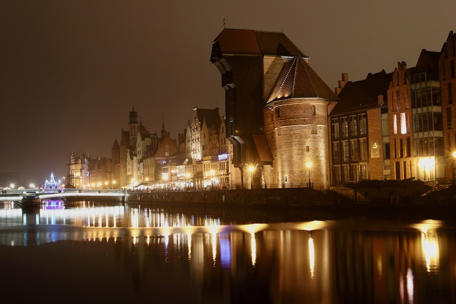 The Old Town of Gdańsk is a magical sight at night, with beautifully illuminated monuments creating a unique and breathtaking atmosphere
