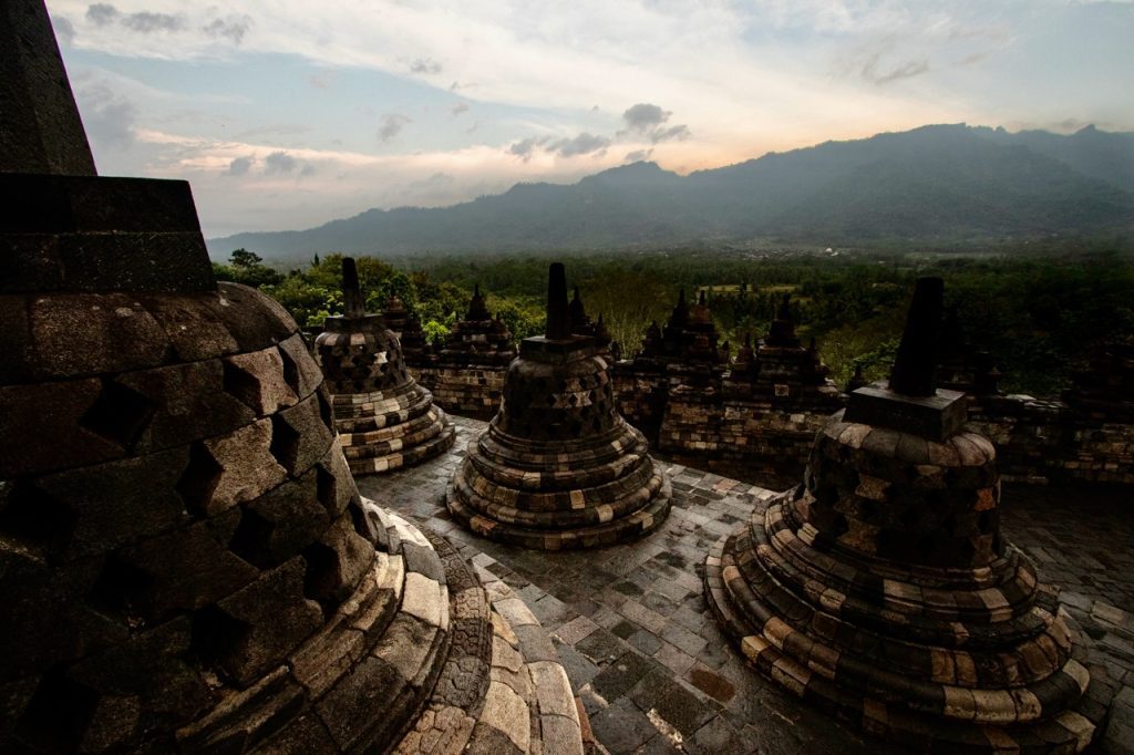 Unpredictable weather at Borobudur Temple in Java adds an element of surprise to the visit