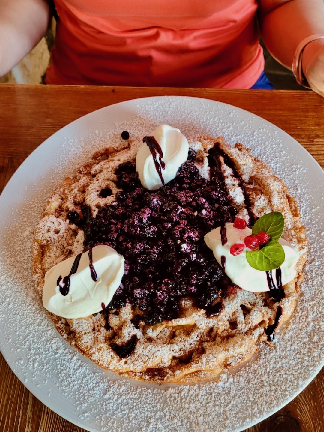 A giant pancake with blueberries, like something from a Bieszczady dream