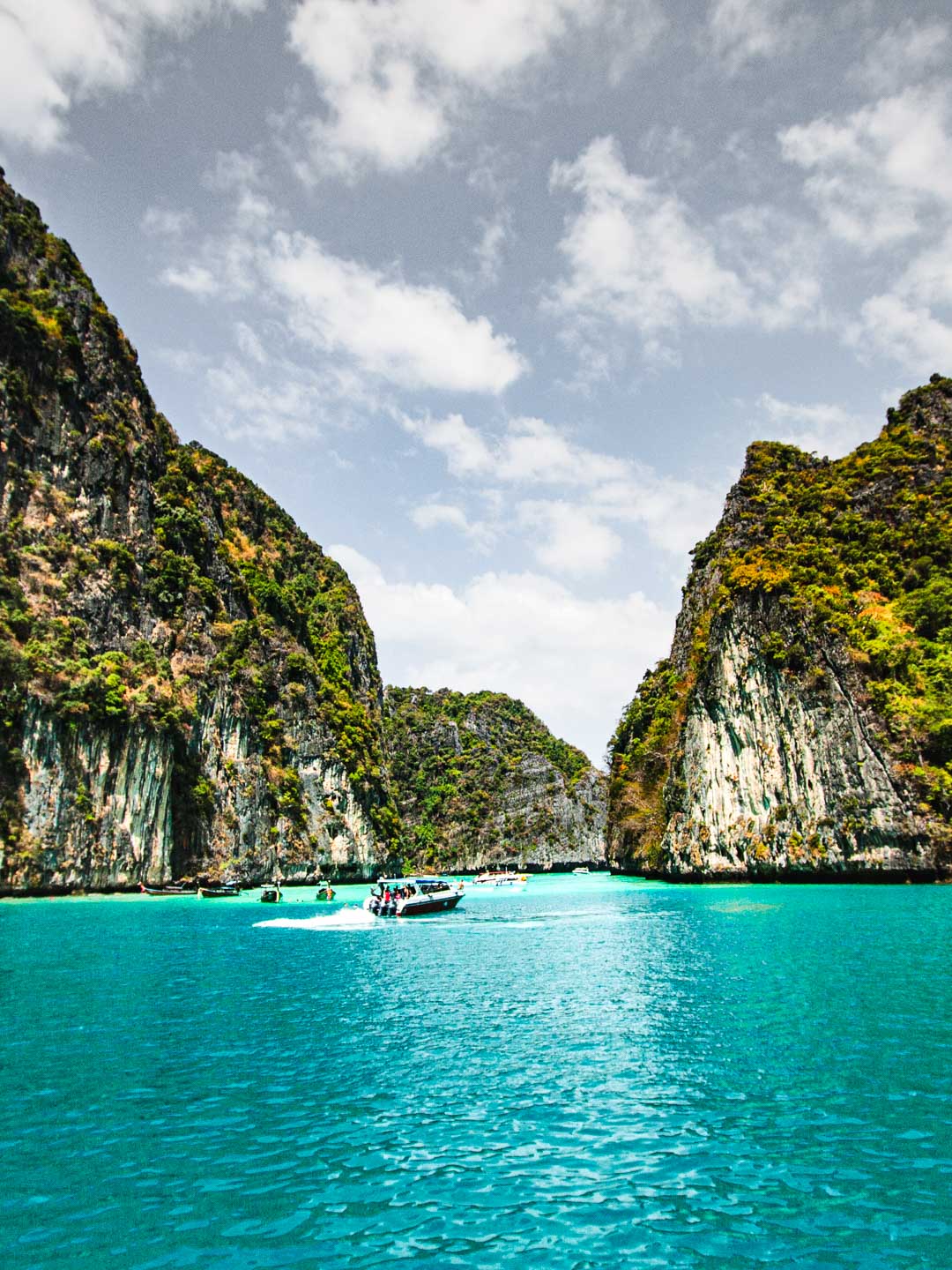 Maya Bay on Phi Phi Leh stuns with its turquoise water and dramatic cliffs