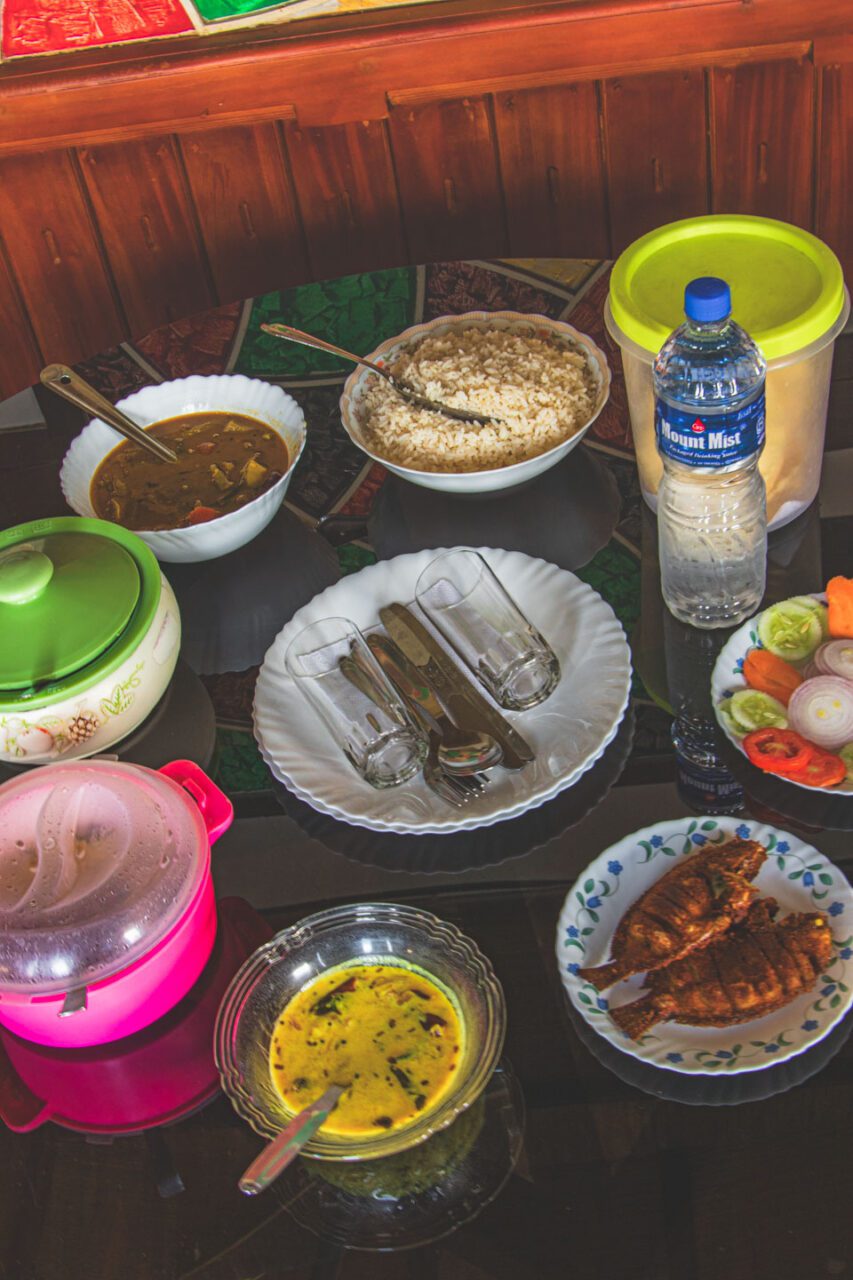 Home-cooked lunch on deck. Kerala tastes better when you eat it with a view of the water.