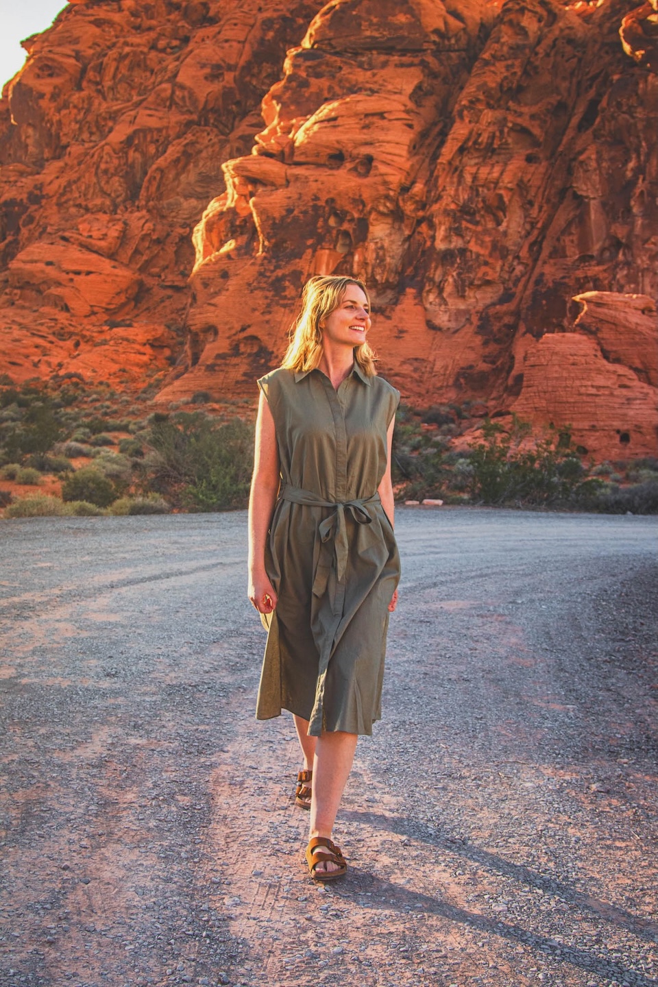 Ania Flik walking through the desert – a portrait of the Runaway Ann blog founder.